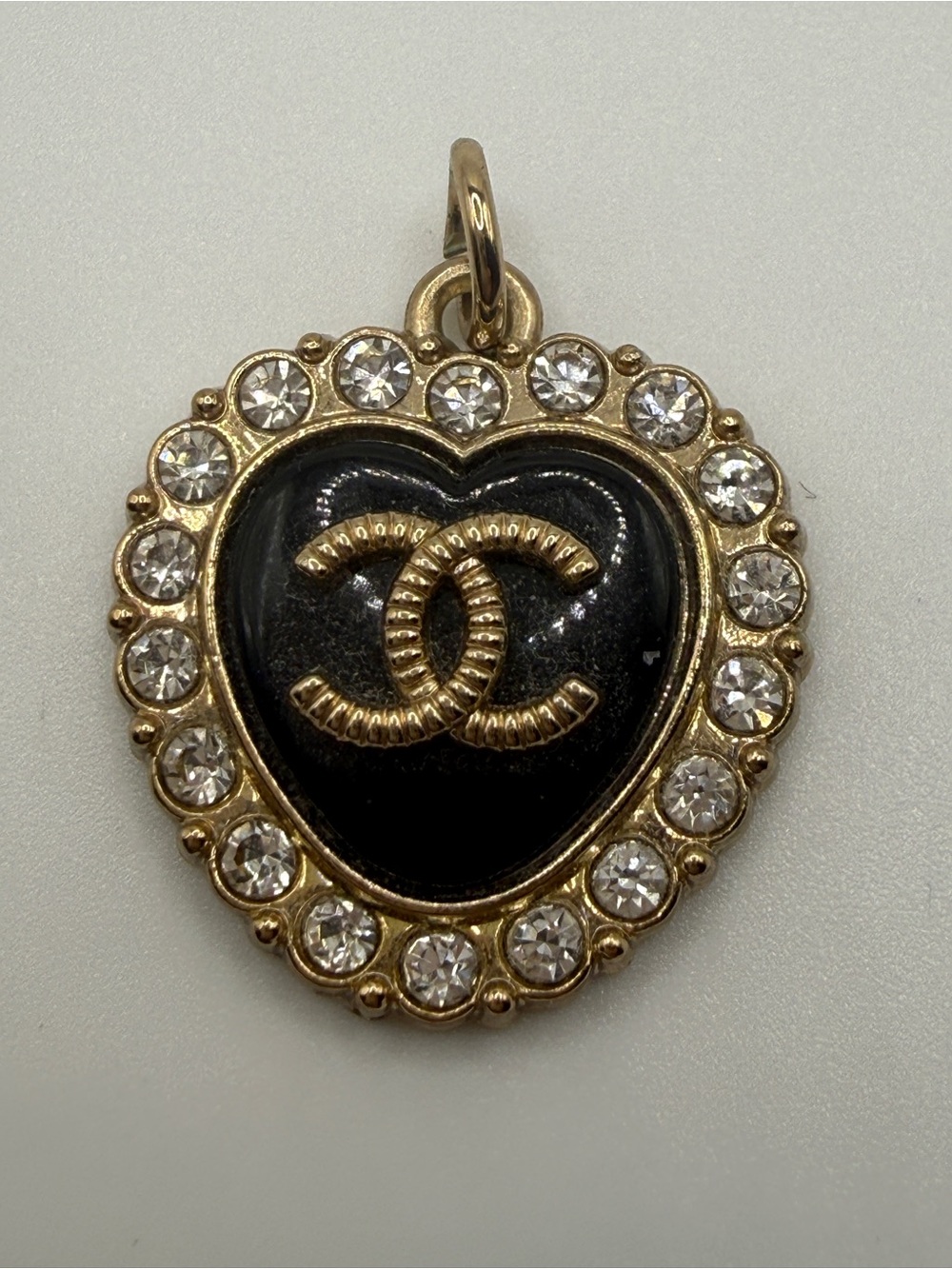 CHANEL Black and Gold Heart Zipper Pull with Crystal Halo